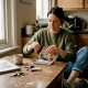 Woman preparing mushroom chocolate squares kitchen